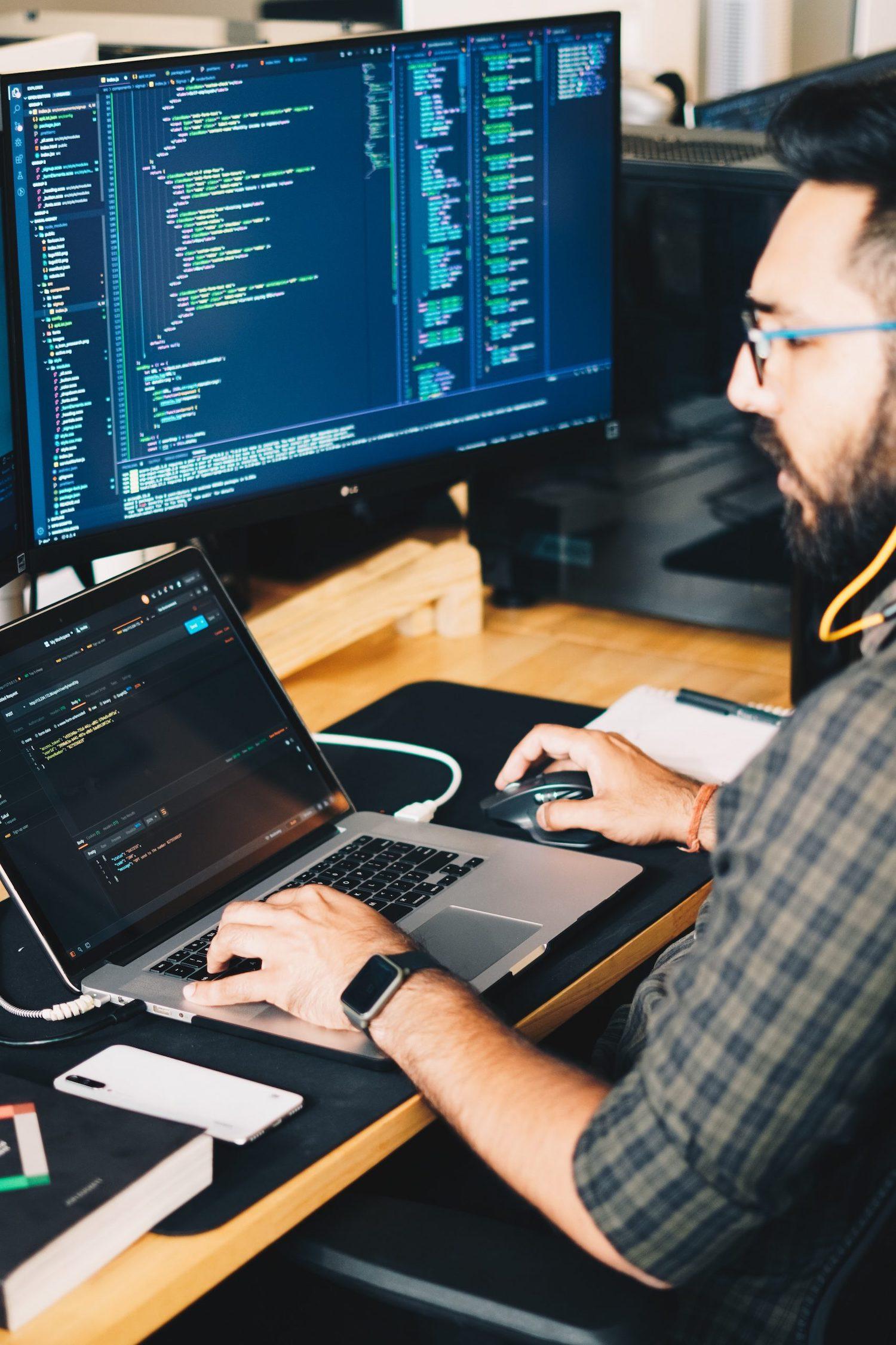 Software Engineer developing an application on a computer. App Developers Australia