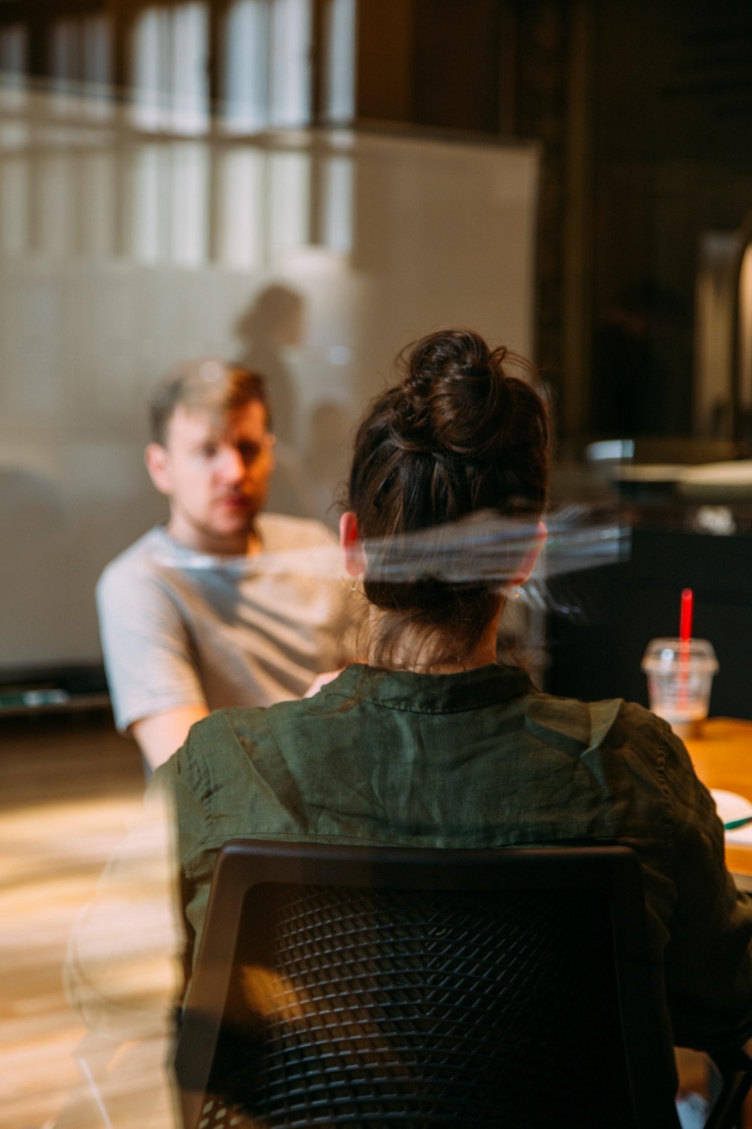 Two people discussing a project idea. Custom Software Australia.